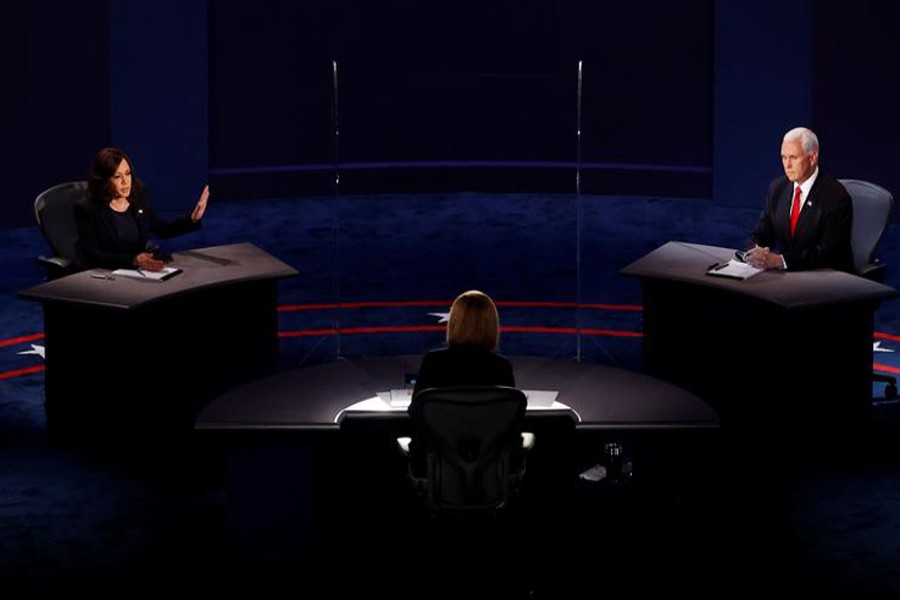 Democratic vice presidential nominee Senator Kamala Harris and Vice President Mike Pence participate in their vice presidential campaign debate held on the campus of the University of Utah in Salt Lake City, Utah, October 7, 2020 -- Reuters