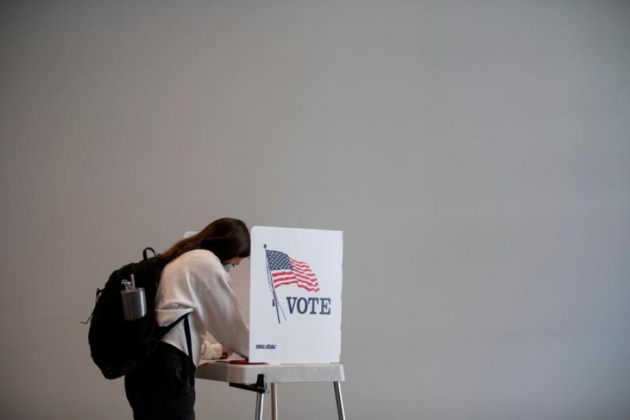 People cast their ballots for the upcoming presidential elections as early voting begins in Ann Arbor, Michigan, US on September 24, 2020 — Reuters/Files