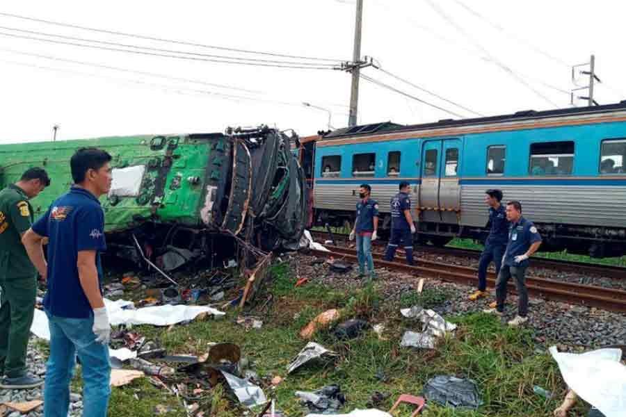 20 killed on temple trip in Thailand as bus, train collide