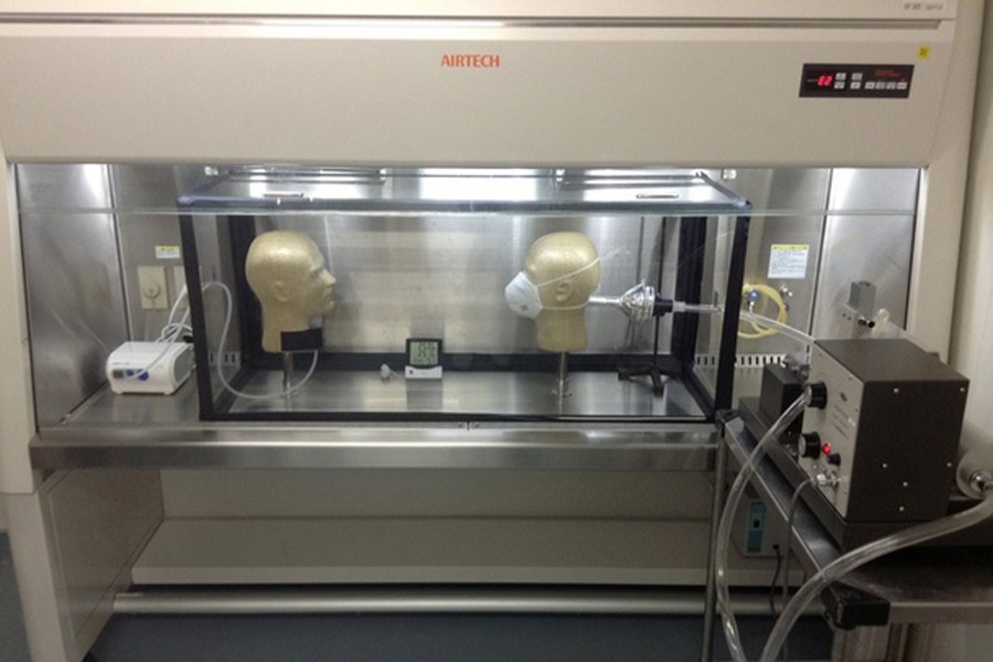 Undated handout from The Institute of Medical Science, University of Tokyo photo shows an experiment that test the effectiveness of face masks in preventing airborne transmission of SARS-CoV-2 — The Institute of Medical Science, University of Tokyo/Handout via Reuters