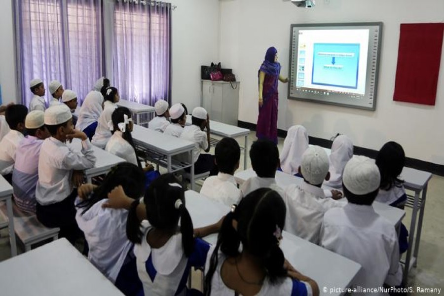 Before COVID-19: Students sit in a digital classroom in the capital, Dhaka