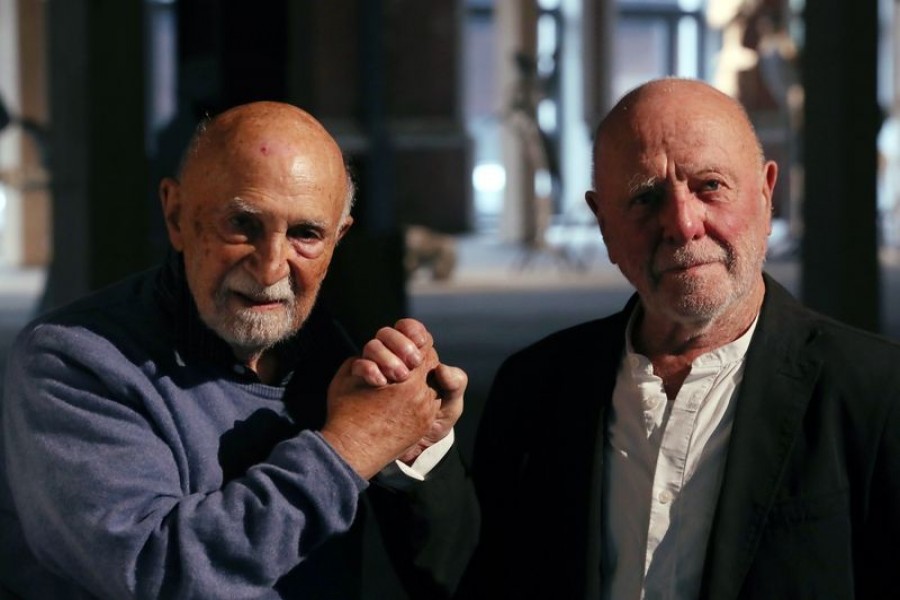 Belgian lawyer and jazz pianist Simon Gronowski, 89, a Jewish survivor of the Holocaust during the Second World War, poses for a photo with a Belgian artist Koenraad Tinel, 86, the son of a Flemish nationalist and Nazi sympathiser, after they became close friends a few years ago, in Brussels, Belgium October 21, 2020. Picture taken October 21, 2020. REUTERS/Yves Herman