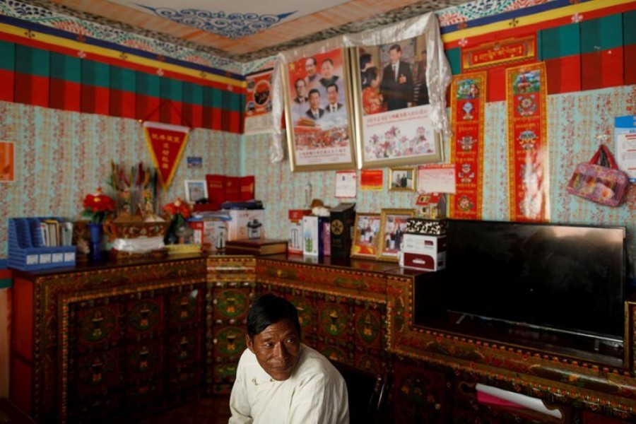 Tibetan rural resident Sonam Tenpa attends a government organised interview about their life after they were relocated from a high-altitude village to government housing in Boma village, during a government-organised tour of the Tibet Autonomous Region, China, October 16, 2020. REUTERS/Thomas Peter