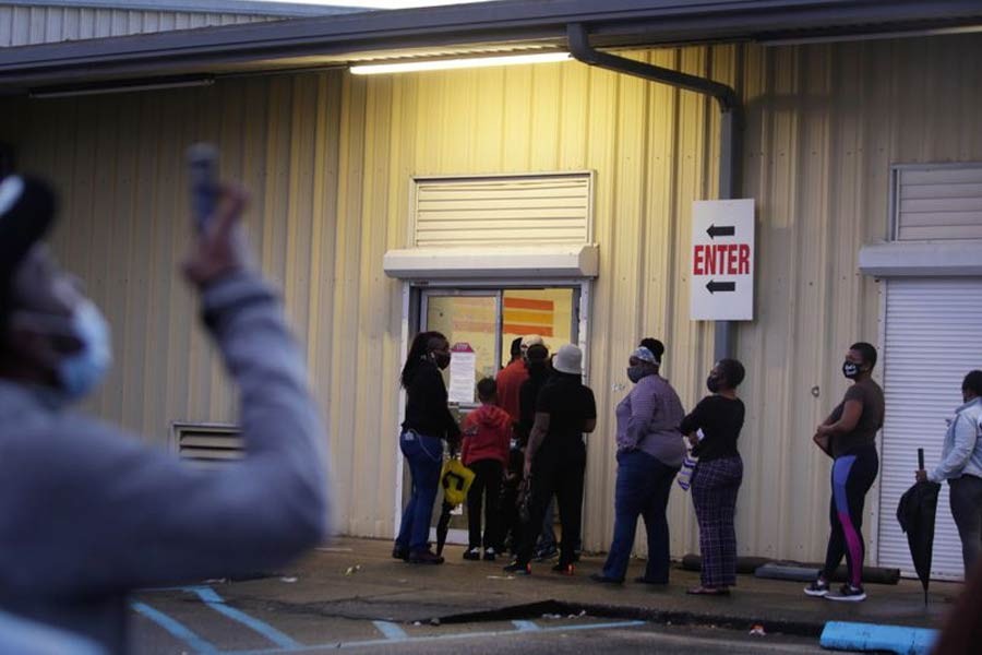 People line up to cast their ballot for the upcoming presidential election as early voting ends as tropical storm Zeta approaches the Gulf Coast in New Orleans, Louisiana, US, recently –Reuters Photo