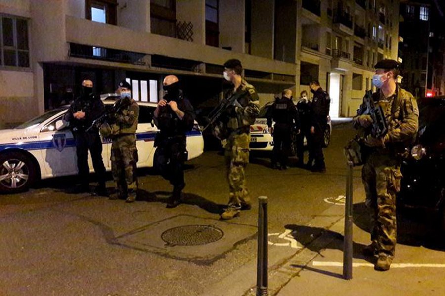 Police secures a street after a Greek Orthodox priest was shot and injured at a church in the centre of Lyon, France, October 31, 2020 -- Reuters