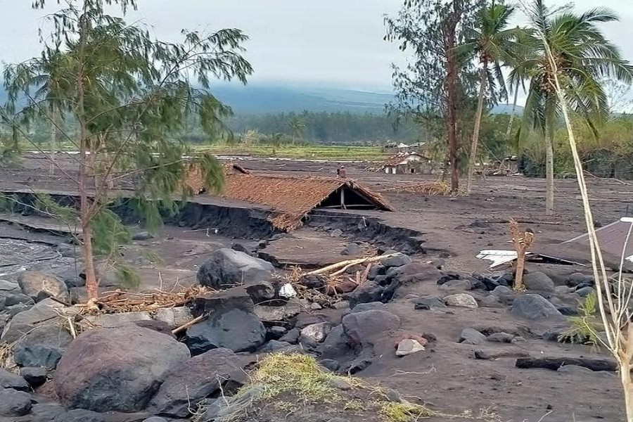 A house is partially submerged in debris after Typhoon Goni swept through Daraga, Albay province, Philippines, November 2, 2020, in this photo obtained from social media. David Lee/via REUTERS