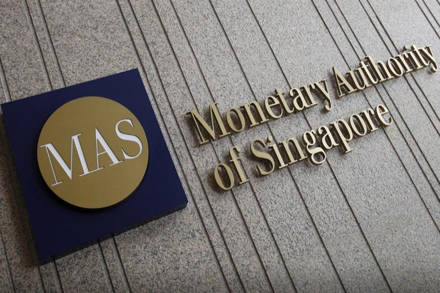 The logo of the Monetary Authority of Singapore (MAS) is pictured at its building in Singapore in this February 21, 2013 Reuters file photo