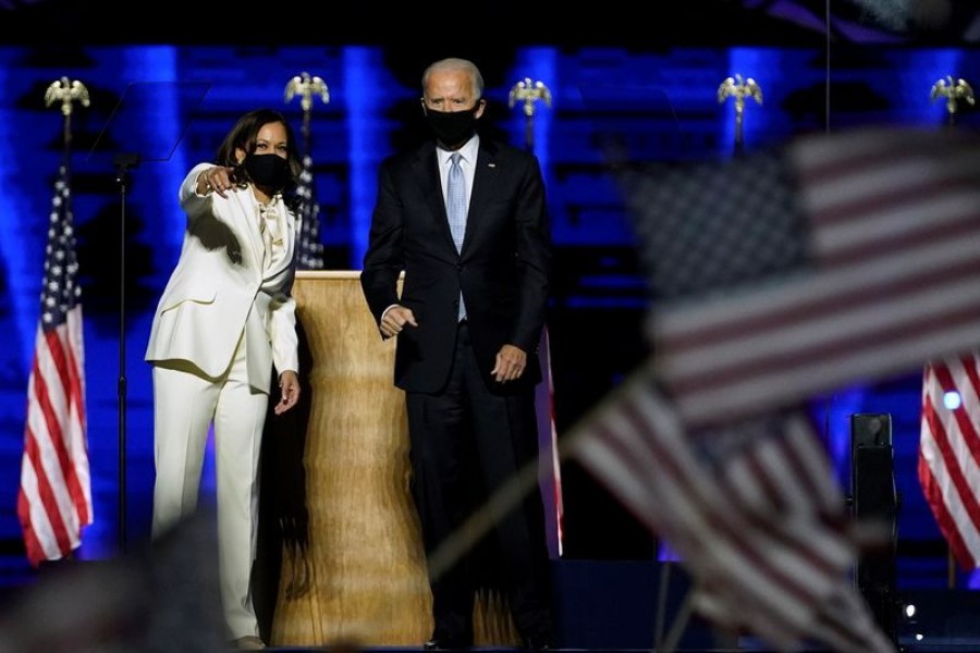 Democratic vice-presidential nominee Kamala Harris and Democratic 2020 US presidential nominee Joe Biden greet supporters at an election rally, after news media announced that Biden has won the 2020 US presidential election, in Wilmington, Delaware, US, November 7, 2020 — Reuters