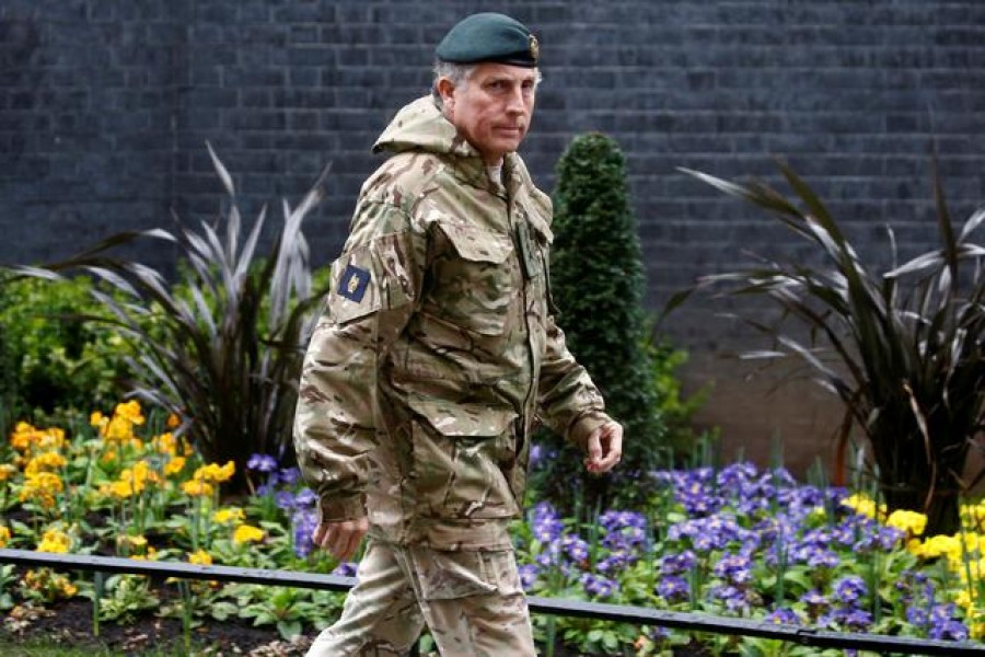 FILE PHOTO: British Army General Sir Nick Carter arrives for a meeting to address the government's response to the coronavirus outbreak, at Downing Street in London, Britain March 12, 2020. REUTERS/Henry Nicholls