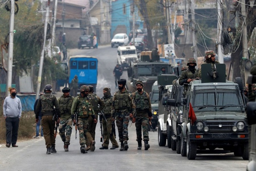 Indian soldiers leave a gun battle site after a suspected militant commander was killed in a gun battle between Indian security forces and suspected militants, at Rangreth on the outskirts of Srinagar, November 1, 2020. Reuters