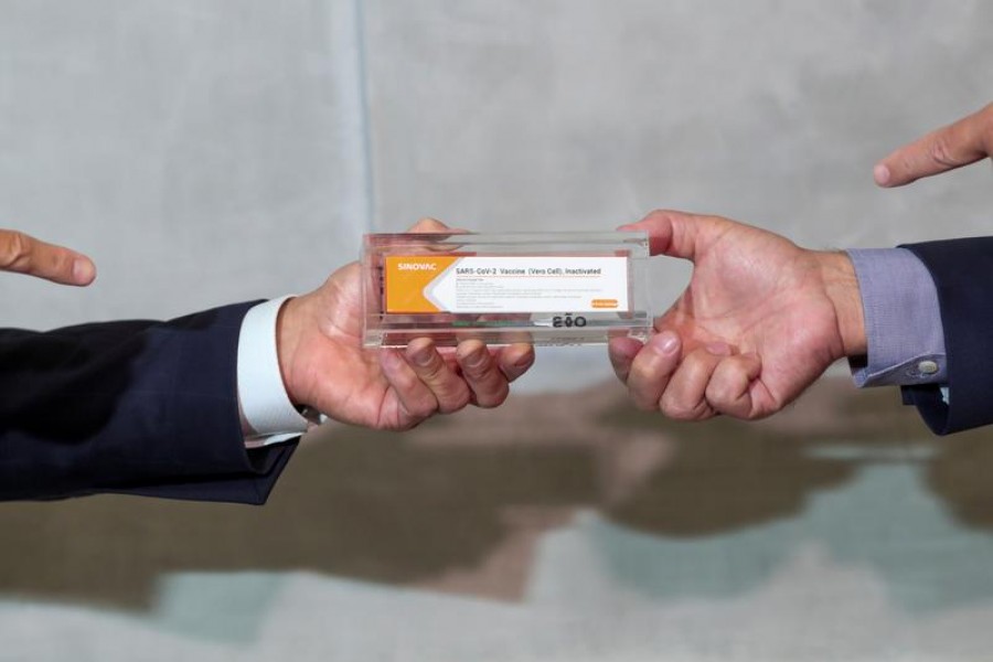 A box of China's Sinovac, a potential vaccine against the coronavirus disease (Covid-19), is held during a news conference at Instituto Butantan in Sao Paulo, Brazil on November 9, 2020 — Reuters photo