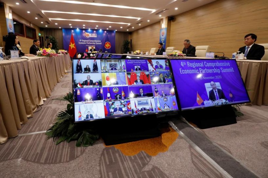 Vietnam's Prime Minister Nguyen Xuan Phuc chairs the 4th Regional Comprehensive Economic Partnership Summit as part of the 37th ASEAN Summit in Hanoi, Vietnam, November 15, 2020 — Reuters