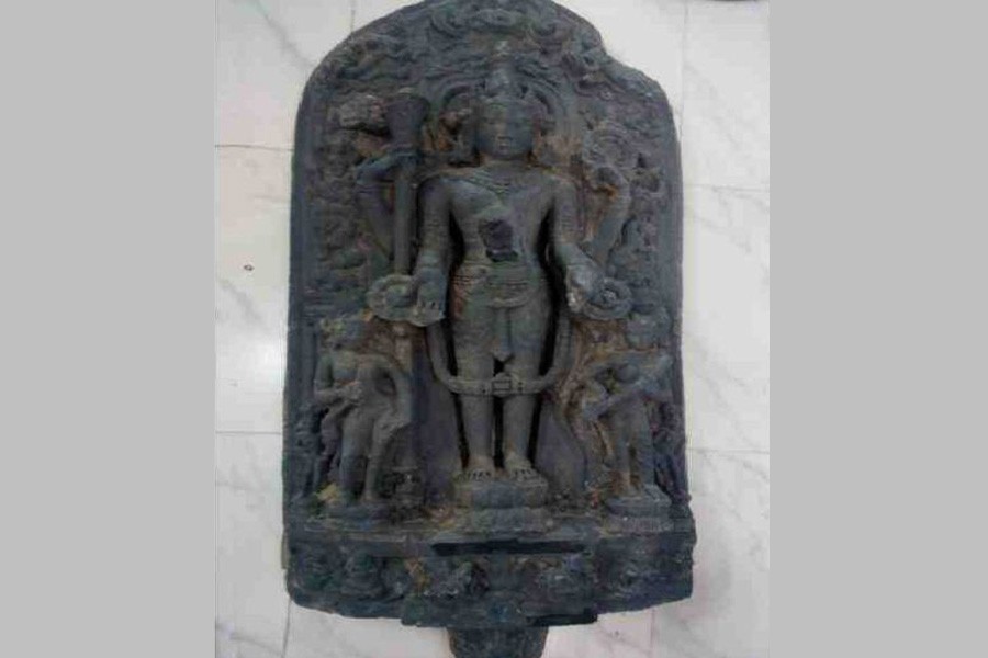 BGB hands over 11 seized touchstone statues Naogaon Archaeology Dept