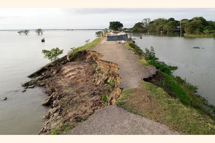 Floods wash away parts of the road project connecting Sunamganj’s Shulla with Derai through the district town — FE Photo