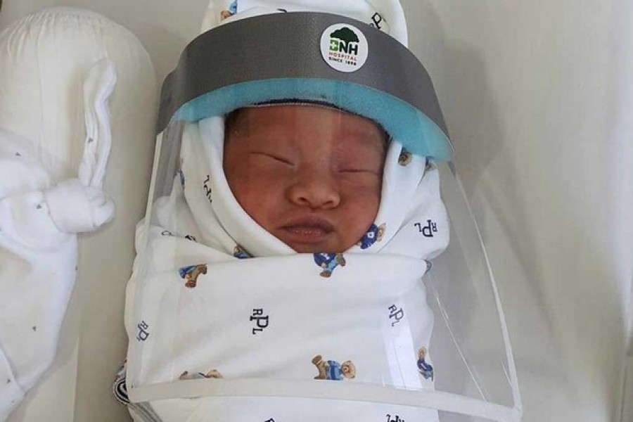 Representational image: A newborn baby is seen in a hospital wearing a protective face shield during the coronavirus disease outbreak in Bangkok, Thailand. via REUTERS