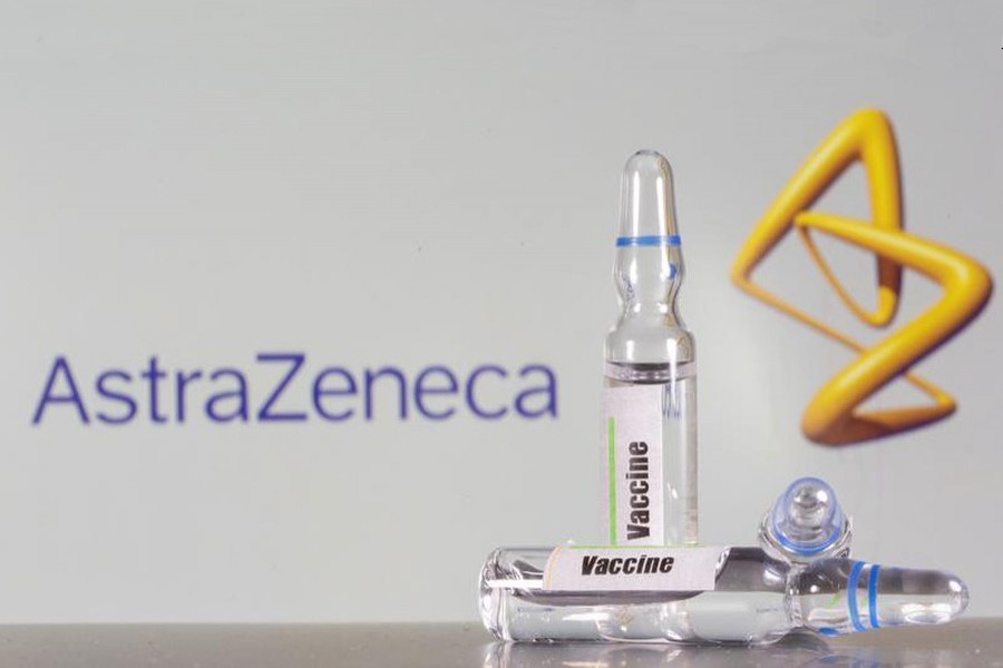 A test tube labelled with the vaccine is seen in front of AstraZeneca logo in this illustration taken on September 9, 2020 — Reuters/Files