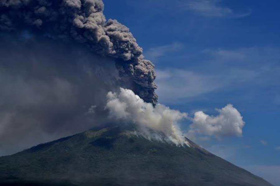 Indonesian volcano erupts, forcing residents to flee