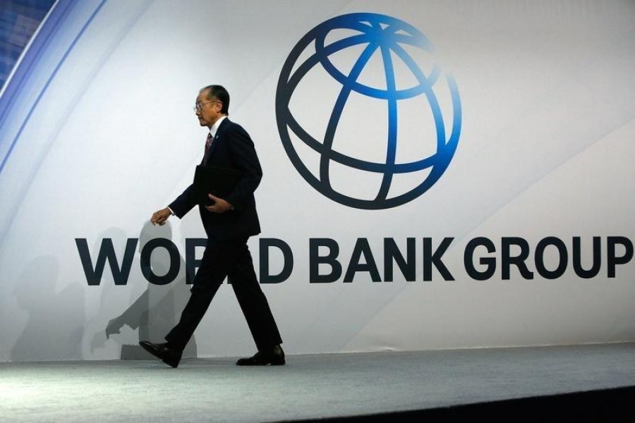 World Bank President Jim Yong Kim takes to the stage to deliver remarks at the plenary session at the IMF-World Bank annual meetings at Constitution Hall in Washington October 10, 2014 – Reuters/Files