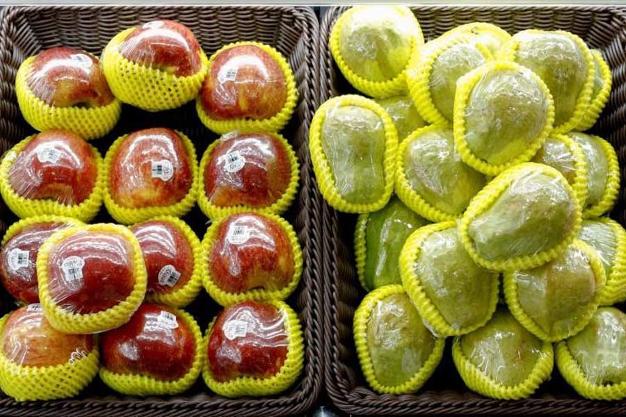 Fruit packaged in plastic are on display at a supermarket in Beijing –Reuters file photo