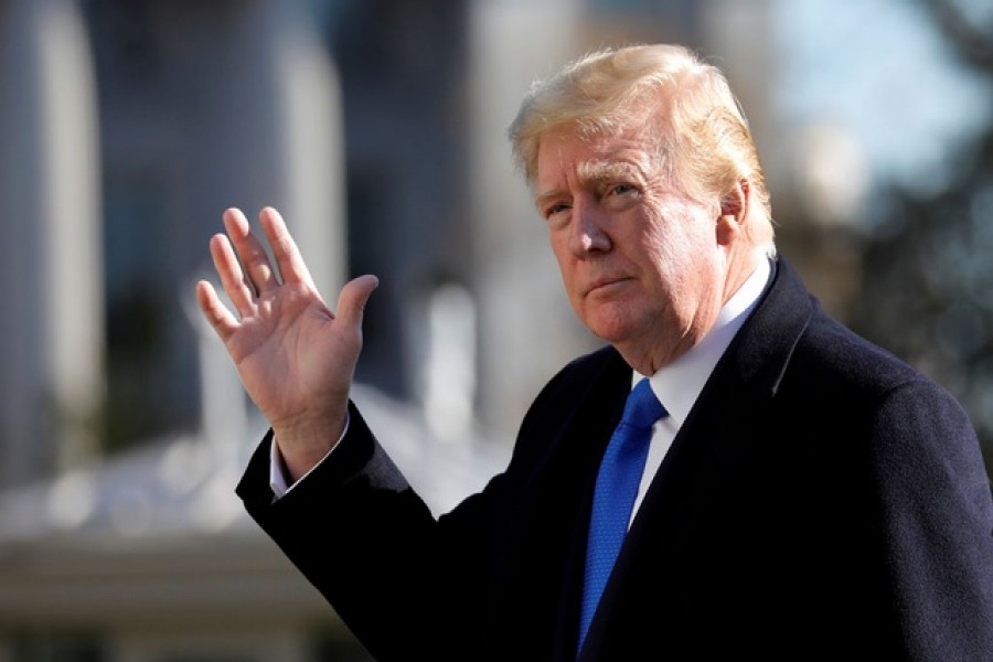 US President Donald Trump waves as he walks on the South Lawn of the White House upon his return to Washington from Camp David, US, November 29, 2020 — Reuters