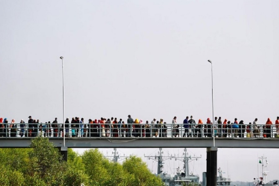 Rohingyas board a ship as they are moving to Bhasan Char island in Chattogram, Bangladesh, Dec 4, 2020 - REUTERS