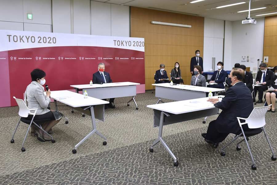 Tokyo 2020 President Yoshiro Mori, second left, Tokyo Governor Yuriko Koike, left, Olympic Minister Seiko Hashimoto, second right, and Tokyo 2020 CEO Toshiro Muto, rear, attending an opening plenary session of the three-party meeting on Tokyo 2020 Games additional costs due to the impact of the COVID-19 pandemic in Tokyo on Friday –AP Photo