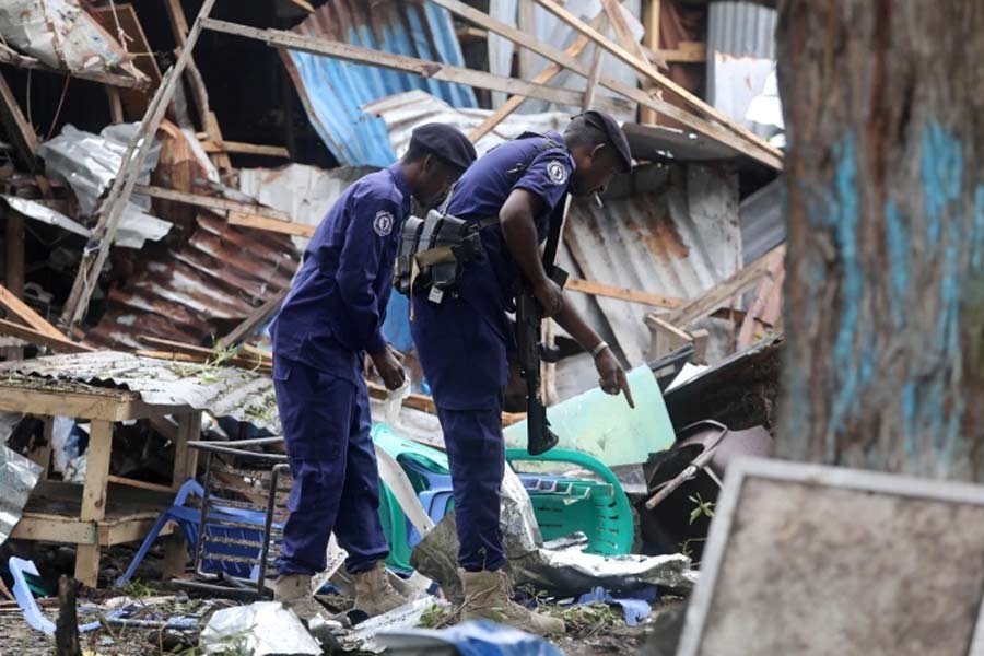 Somali policemen at the scene of a suicide explosion at a restaurant near a police academy in Mogadishu of Somalia on November 17 –Reuters file photo