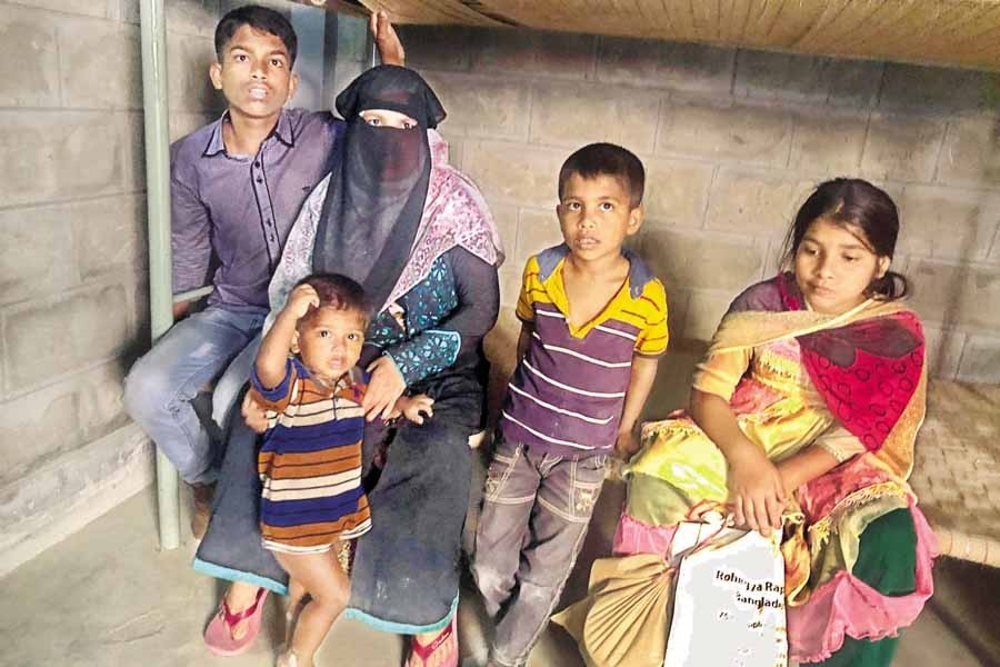 A Rohingya family on Saturday in their dwelling at Bhasanchar after the first batch of them relocated to the remote island from Cox’s Bazar — FE photo