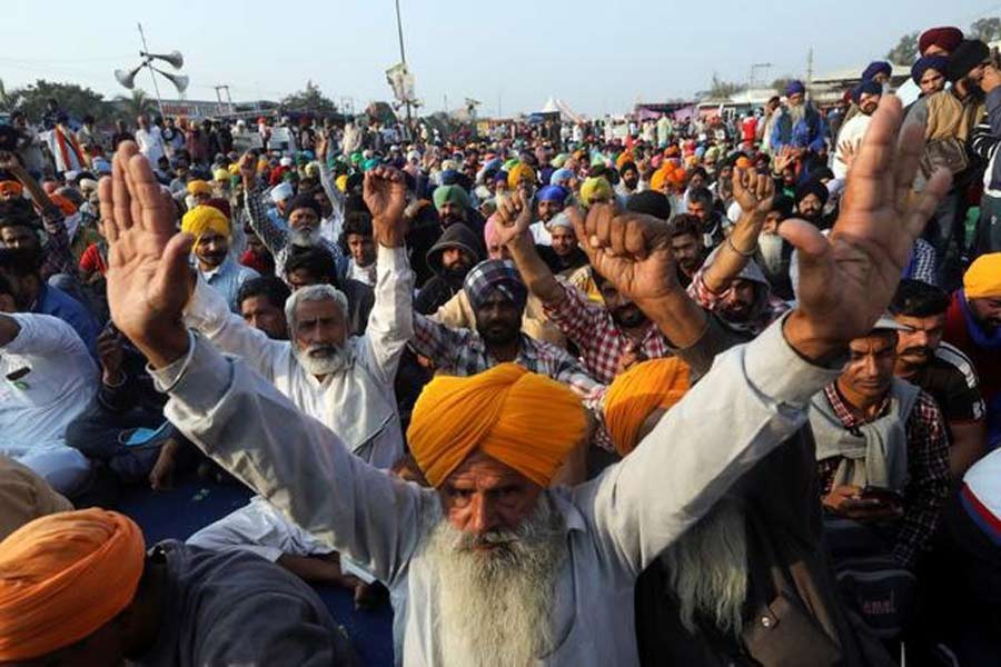 Demonstrators protesting the newly-passed farm bills at Singhu border near New Delhi on December 10 –Reuters file photo