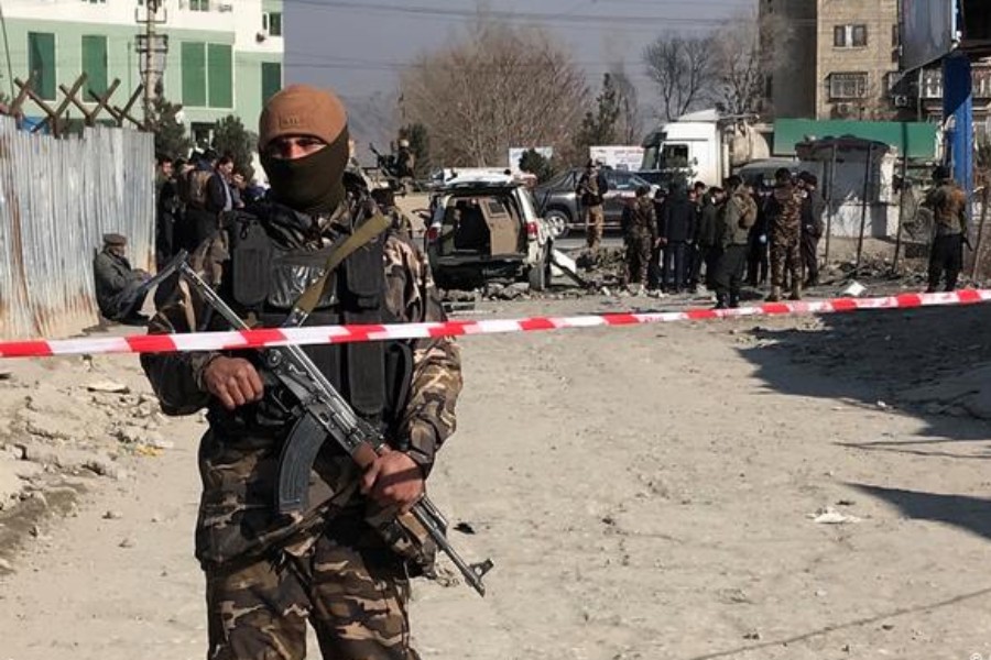 An Afghan security officer keeps watch at the site of a blast in Kabul, Afghanistan December 15, 2020. REUTERS/Omar Sobhani