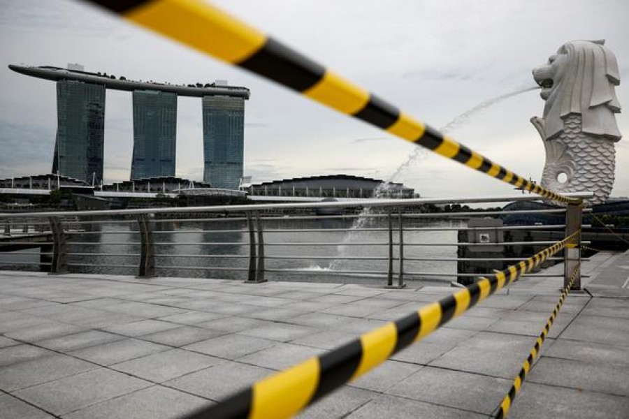 A view of a cordoned off area at the Merlion Park is seen amid the coronavirus disease (COVID-19) outbreak in Singapore, May 27, 2020. REUTERS/Edgar Su/File Photo