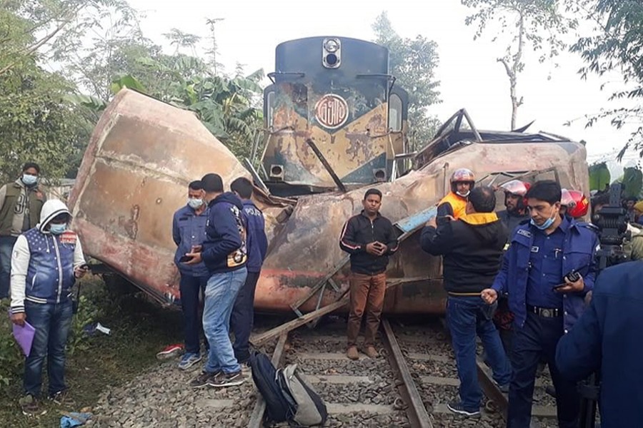 Police officials at the scene of a fatal road crash in Joypurhat. Photo source: Facebook/Traffic Alert