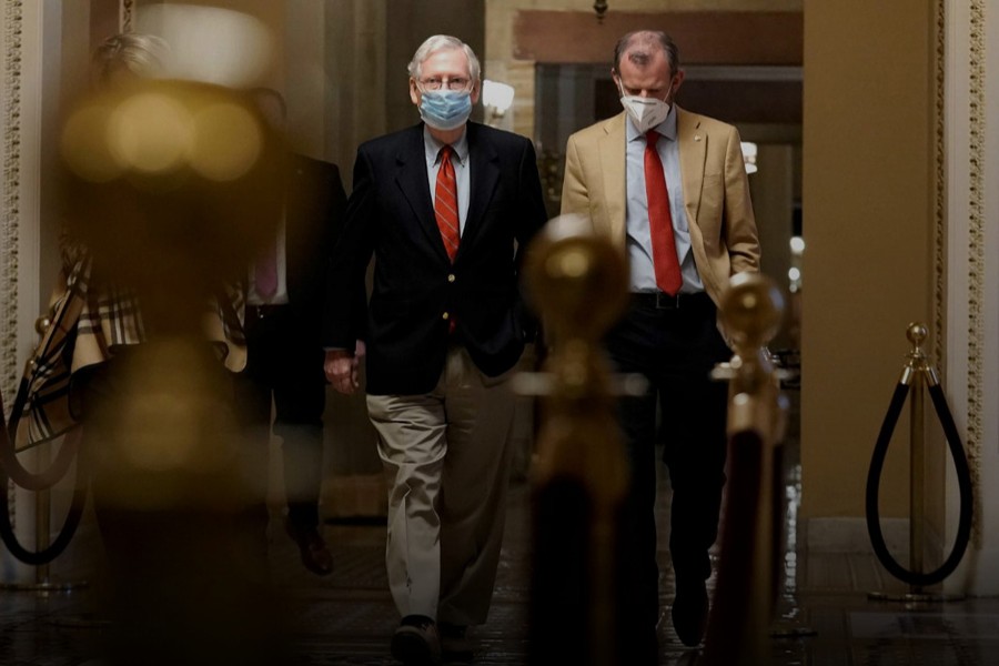 US Sen. Majority Leader Mitch McConnell (R-KY) walks from his office to the Senate floor on Capitol Hill Washington, DC, US on Sunday, December 20, 2020 — Reuters photo