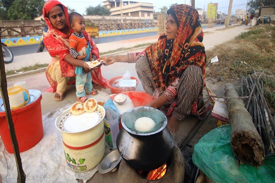 Brisk sales of winter cake of 'vapa pitha' here and there