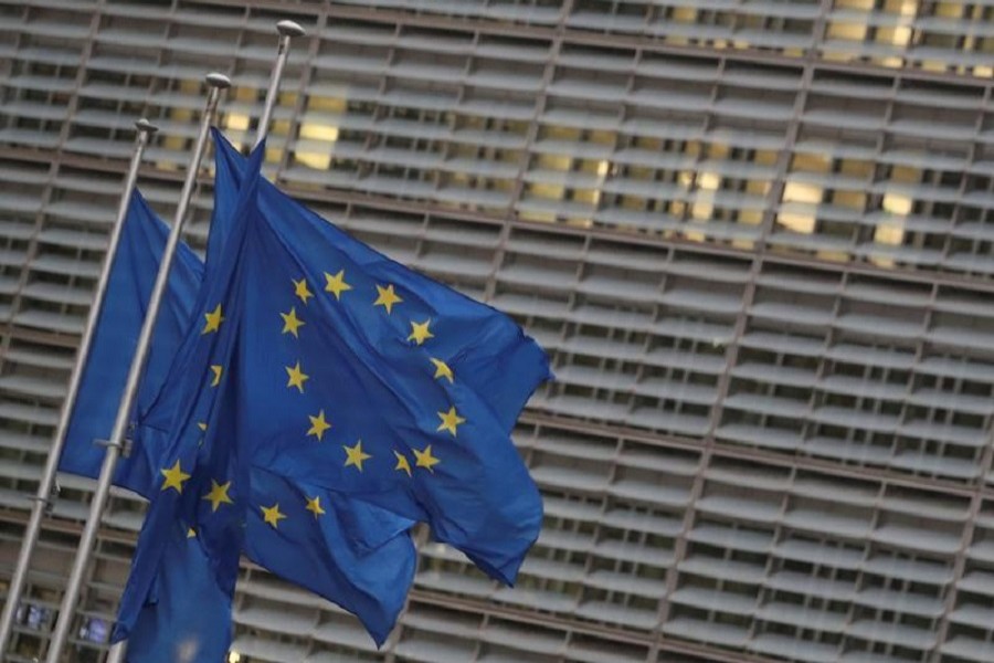 European Union flags flutter outside the European Commission headquarters, where Brexit talks are taking place, in Brussels, Belgium, December 24, 2020 — Reuters