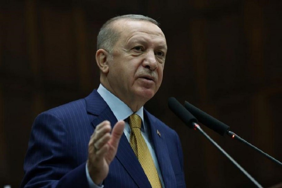 Turkish President Tayyip Erdogan addresses members of his ruling AK Party during a meeting at the parliament in Ankara, Turkey, December 23, 2020 — Presidential Press Office/Handout via Reuters