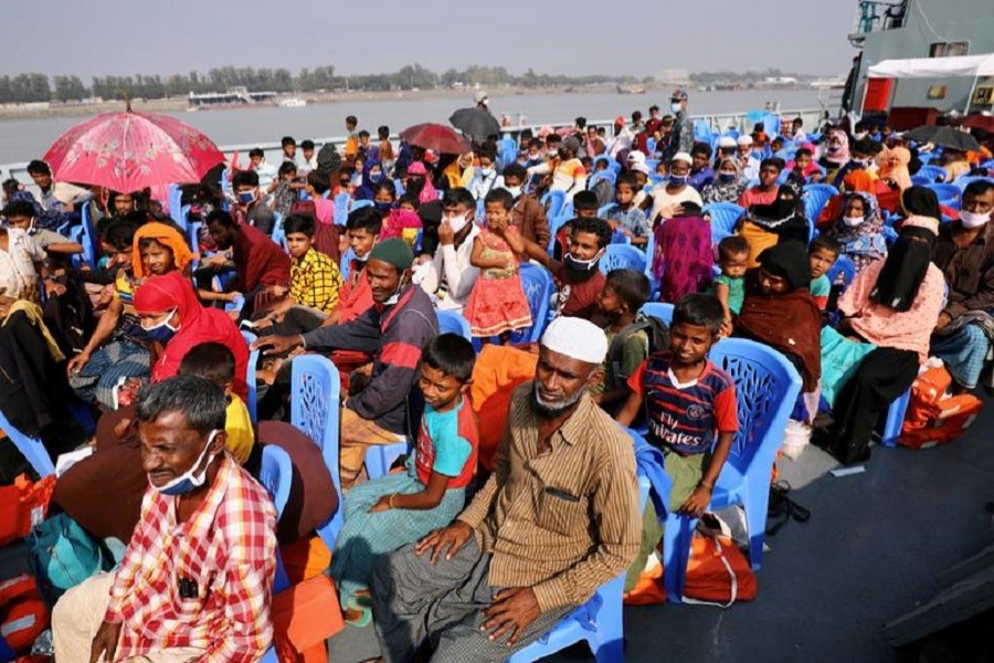 Rohingyas are seen onboard a ship as they are moving to Bhasan Char island in Chattogram, Bangladesh, December 4 — Reuters/Files