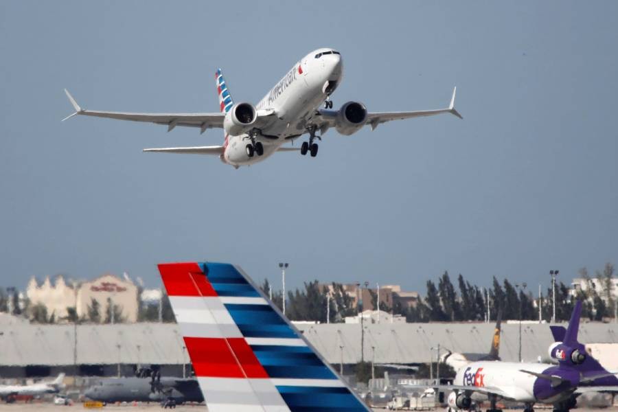 American Airlines flight 718, the first US Boeing 737 MAX commercial flight since regulators lifted a 20-month grounding in November, takes off from Miami, Florida, US, December 29, 2020. REUTERS/Marco Bello