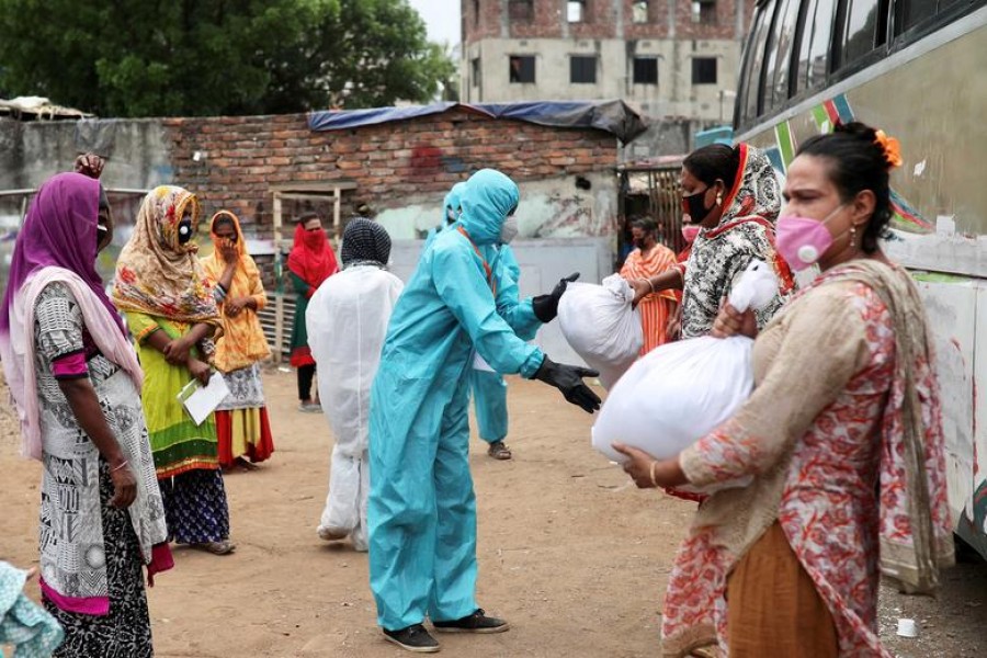 Representational image: Volunteers from an organisation distribute relief supplies among transgenders, amid the coronavirus disease (Covid-19), in Dhaka, Bangladesh, April 23, 2020 — Reuters/Files