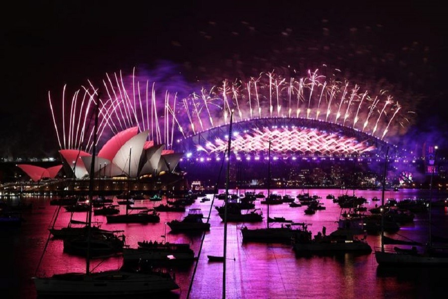 Fireworks explode over the Sydney Opera House and Sydney Harbour Bridge during downsized New Year's Eve celebrations due to an outbreak of the coronavirus disease (Covid-19) in Sydney, Australia, January 1, 2021 — Reuters/Files