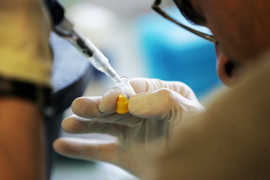 A laboratory researcher is seen in this Reuters file photo