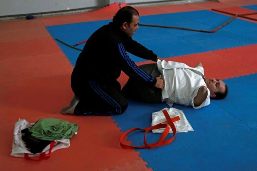 Palestinian man with disabilities conquers karate