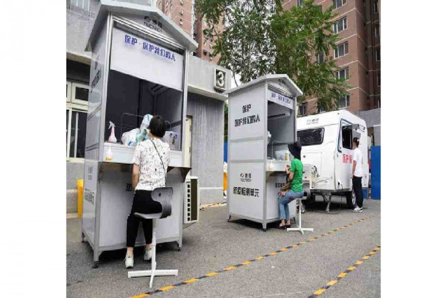 China builds hospital in five days after surge in virus cases