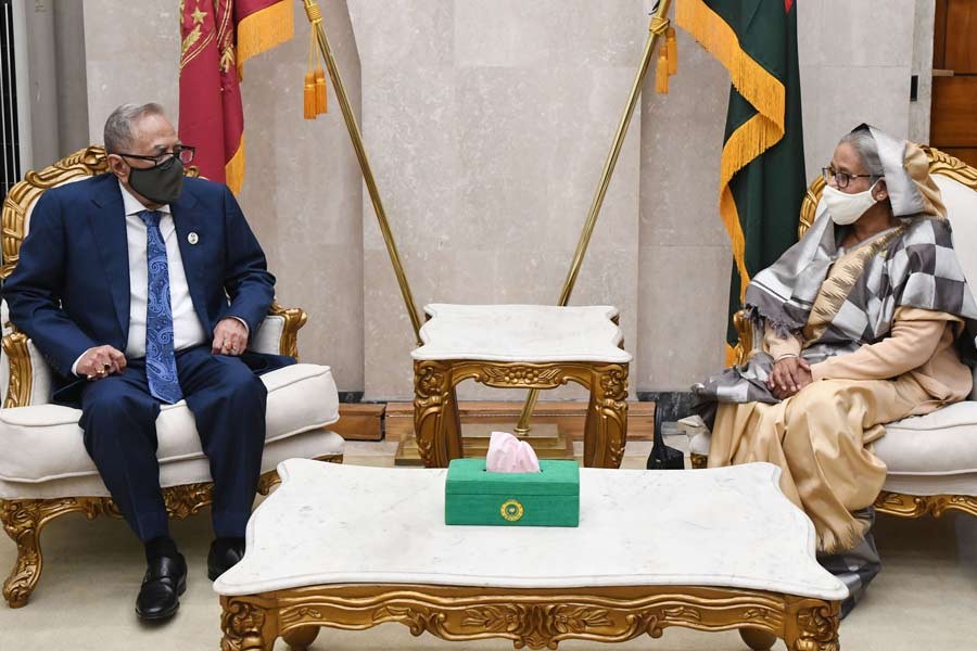 Prime Minister Sheikh Hasina paying a courtesy call on President Abdul Hamid at the President's Chamber in the parliament complex on Monday. –PID Photo