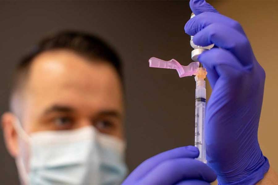 Pharmacist Ali Zamia filling a syringe with the Moderna vaccine at a vaccination programme during the outbreak of the coronavirus disease (COVID-19) in California of the United States recently –Reuters file photo