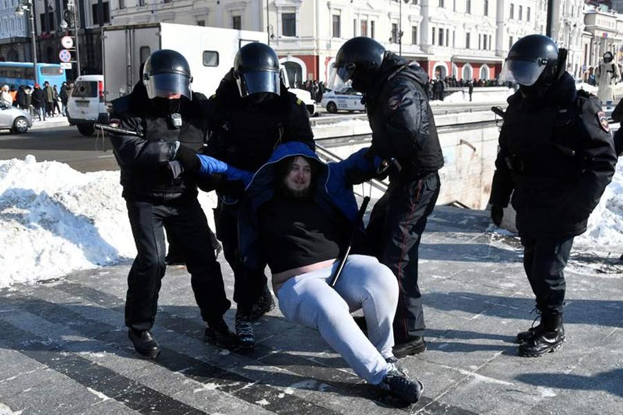 Russian law enforcement officers detain a man during a rally in support of jailed Russian opposition leader Alexei Navalny in Vladivostok on Sunday –Reuters photo