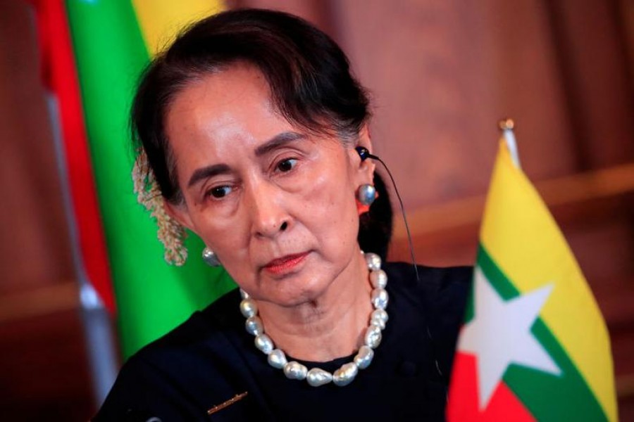 Myanmar's State Counsellor Aung San Suu Kyi attends the joint news conference of the Japan-Mekong Summit Meeting at the Akasaka Palace State Guest House in Tokyo, Japan, October 9, 2018 — Franck Robichon/Pool via Reuters/File Photo