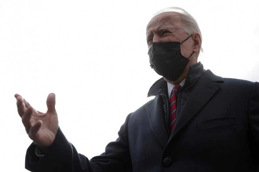 US President Joe Biden speaks to journalists before boarding Marine One at the White House in Washington, US, January 29, 2021 — Reuters