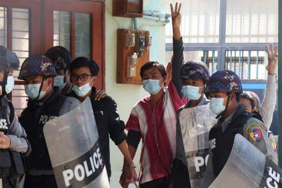 Students arrive at a court after being arrested in a demonstration against the military coup in Myanmar on Friday -Reuters Photo