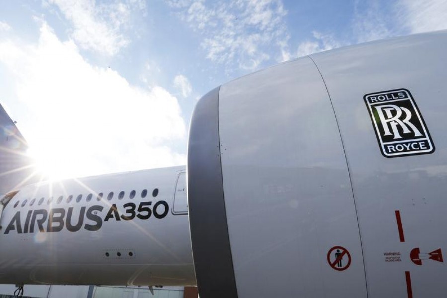 FILE PHOTO: An Airbus A350 is pictured with a Rolls-Royce logo at the Airbus headquarters in Toulouse, France December 4, 2014. REUTERS/ Regis Duvignau/File Photo